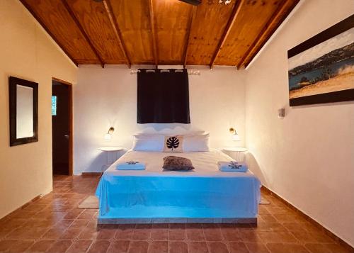 Postel nebo postele na pokoji v ubytování Villas del lago resort