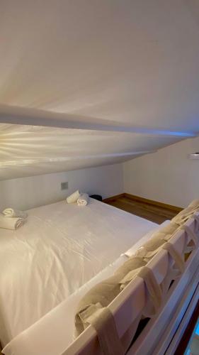 Ένα ή περισσότερα κρεβάτια σε δωμάτιο στο Casa Luci