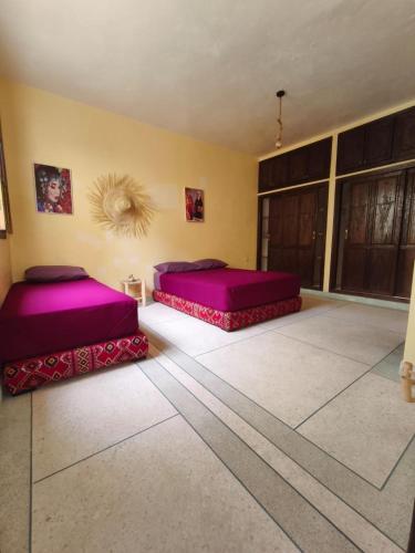 Ένα ή περισσότερα κρεβάτια σε δωμάτιο στο Maison LFarah Agadir