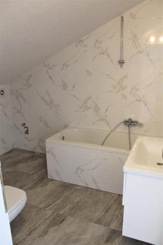 Koupelna v ubytování APARTMANI BELVEDERE BILO