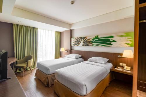 Cama o camas de una habitación en Soll Marina Hotel Serpong
