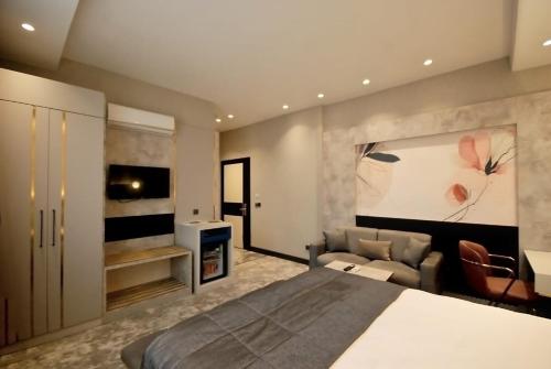 מיטה או מיטות בחדר ב-Starton Hotel