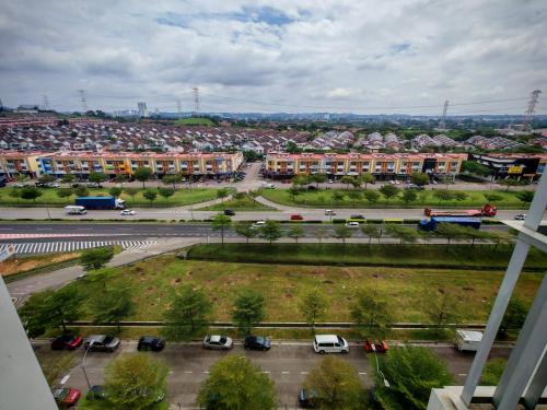 an aerial view of a parking lot in a city at Azzahra Homestay Masai Pasir Gudang in Masai