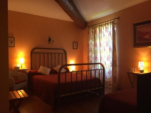 Postel nebo postele na pokoji v ubytování Domaine De Brousson