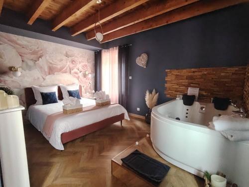 Katil atau katil-katil dalam bilik di Rose & Blue Spa proche Chalon S/Saône et Beaune