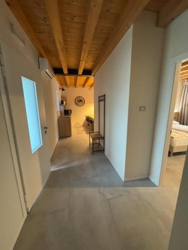 Ένα ή περισσότερα κρεβάτια σε δωμάτιο στο Hillside House Sant'Andrea
