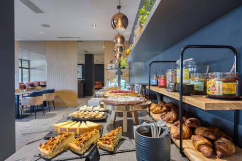 a bakery with a variety of breads and pastries on display at Level 5 Rovinj - Adults Only in Rovinj