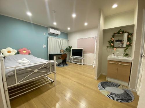 Ένα ή περισσότερα κρεβάτια σε δωμάτιο στο Hiregasaki, Nagareyama 1号