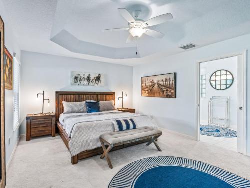 a bedroom with a bed and a ceiling fan at 3215 Z6 VILLAGE OF FENNEY by REMAX Premier in The Villages