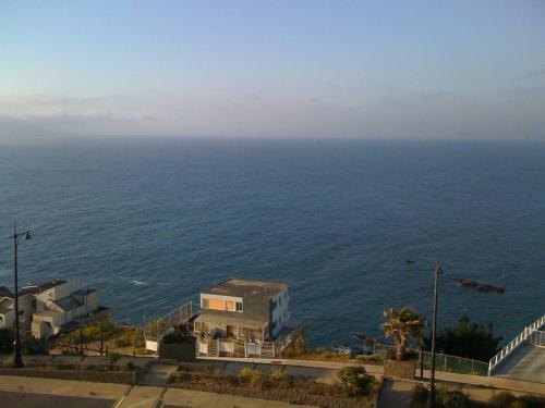 a view of the ocean from a building at Stunning views of the Pacific Ocean in Concón