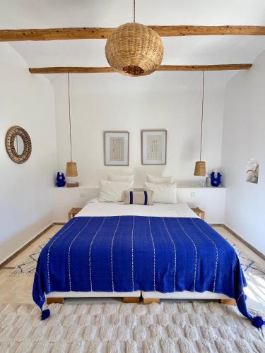 Ένα ή περισσότερα κρεβάτια σε δωμάτιο στο Maison Flamingo