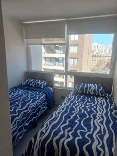 Postel nebo postele na pokoji v ubytování sandiego376blas