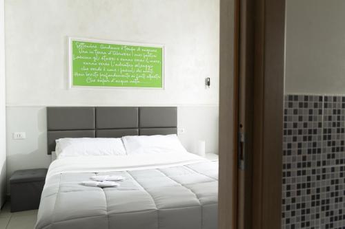 Postel nebo postele na pokoji v ubytování Terrazze Dannunziane