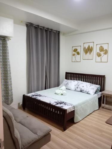 Postel nebo postele na pokoji v ubytování JFam Suites, C2-5F 1BR , Up To 7 Pax