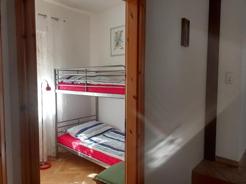 Ένα ή περισσότερα κρεβάτια σε δωμάτιο στο Haus Renia
