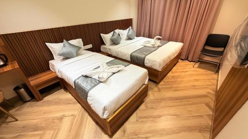 Cama o camas de una habitación en Grand Sea Way