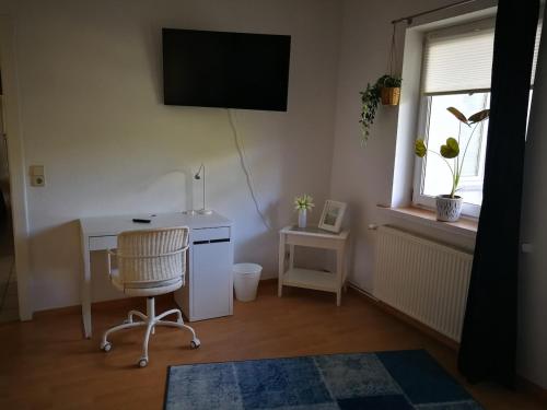 TV a/nebo společenská místnost v ubytování City Appartements Köthen