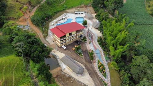 an aerial view of a house with a train at hacienda hotel texas in Durania