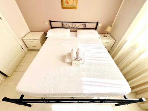 Ένα ή περισσότερα κρεβάτια σε δωμάτιο στο Luxury Penthouse Belvedere Suite - Ospedaletti