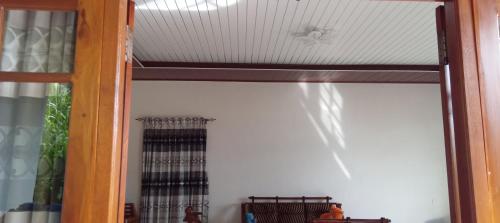 a reflection of a ceiling in a mirror at Star View Kandy in Kandy