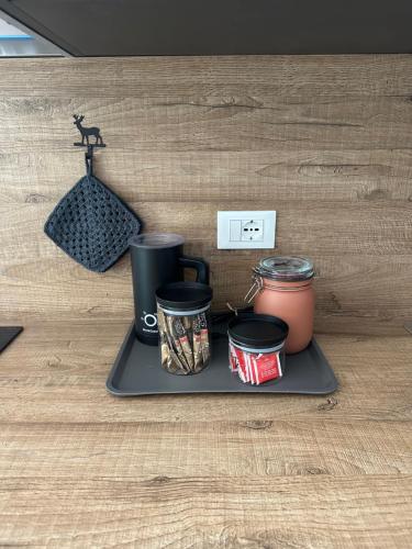 Utensilios para hacer té y café en Il nido Carona