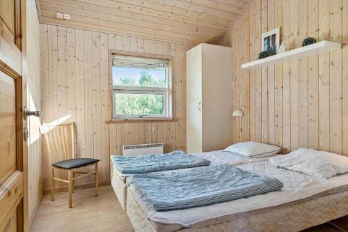 Ένα ή περισσότερα κρεβάτια σε δωμάτιο στο TV1046-Bindslev-Falkevej-1