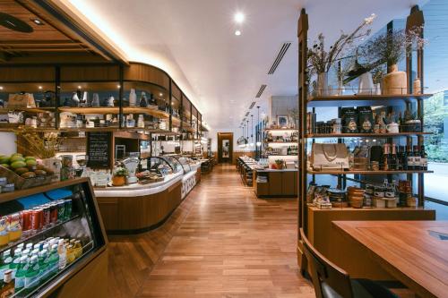 a grocery store with a counter and a grocery storeacistacistacistacistventoryventory at InterContinental Singapore Robertson Quay by IHG in Singapore