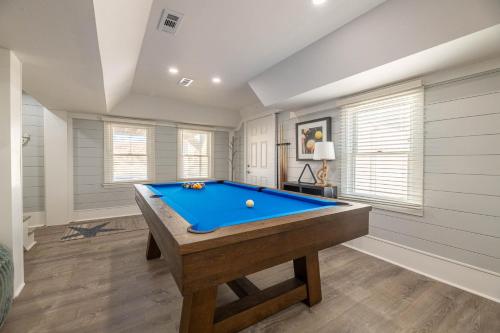 a pool table in a room with white walls at Experience Ocean Views at Pinstripe Paradise, 5 BR, Pool, Pets OK! in Avalon Bench