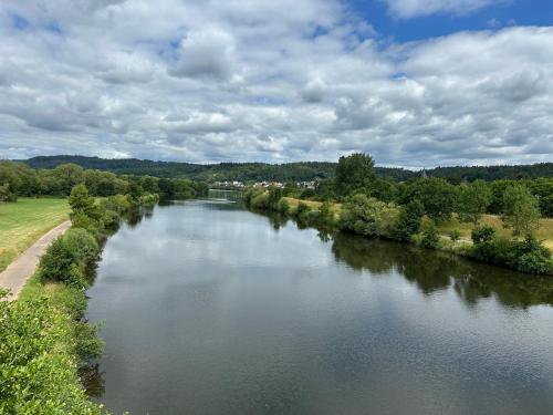 a view of a river from a bridge at Große 2 Ferienwohnung Gästehaus NEUBAU Merzig 100 m2 in Merzig