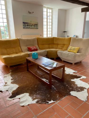 Zona d'estar a La maison des puits