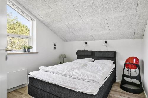 Ένα ή περισσότερα κρεβάτια σε δωμάτιο στο TV1028-Albaek-Magevej-9