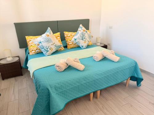 Postel nebo postele na pokoji v ubytování jrg - A CASA DI MAMMA -