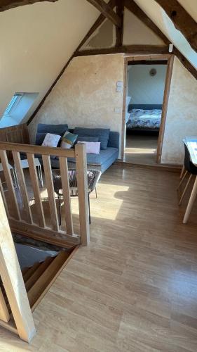 Una cama o camas en una habitación de Longère proche St Jacut de la mer Côtes d'Armor