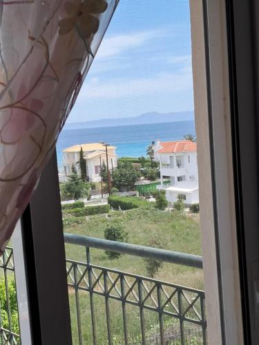 a view from a window of the ocean at E&M See View in Polykhrono