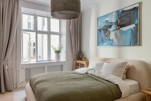 Ένα ή περισσότερα κρεβάτια σε δωμάτιο στο Modern Central