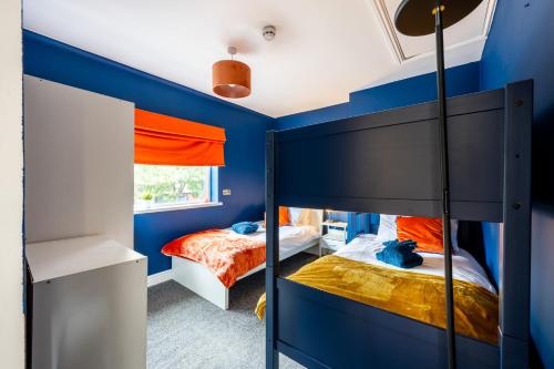 Katil atau katil-katil dalam bilik di Cosy centrally located house