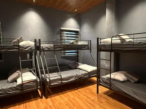 Ένα ή περισσότερα κρεβάτια σε δωμάτιο στο Casa Soleia Guesthouse Bataan