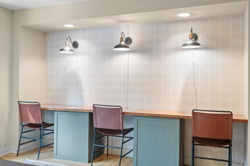 a conference room with a table and chairs at Woodland Hollow in Minnetonka