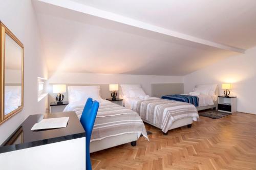 Кровать или кровати в номере White Residence Accommodation