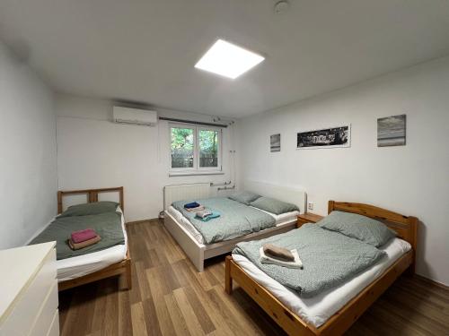 Ένα ή περισσότερα κρεβάτια σε δωμάτιο στο Maláta Homes