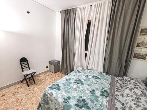 Postel nebo postele na pokoji v ubytování In the Heart of Rome