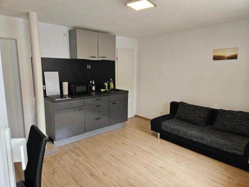 Kuchyň nebo kuchyňský kout v ubytování Gemütliche Wohnung in Happenbach