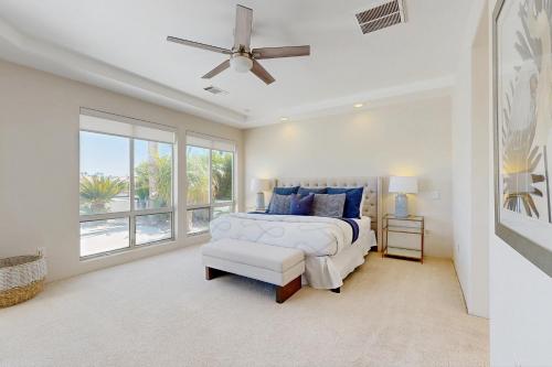 a bedroom with a bed and a window at La Quinta Fairways in La Quinta