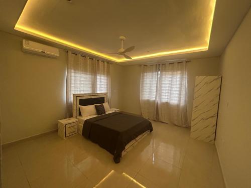 Ένα ή περισσότερα κρεβάτια σε δωμάτιο στο Agape Villa