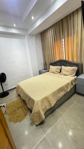 a bedroom with a large bed in a room at Apartmet luxury monaco in Juan López