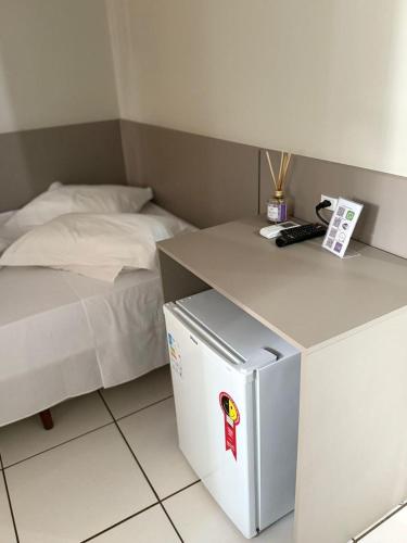 Katil atau katil-katil dalam bilik di Hotel Andorinha - Realeza - PR
