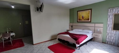 Ένα ή περισσότερα κρεβάτια σε δωμάτιο στο Hotel Gran Fenícia Marechal