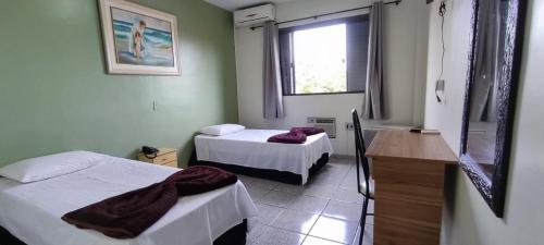 Ένα ή περισσότερα κρεβάτια σε δωμάτιο στο Hotel Gran Fenícia Marechal