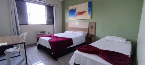 Ένα ή περισσότερα κρεβάτια σε δωμάτιο στο Hotel Gran Fenícia Marechal