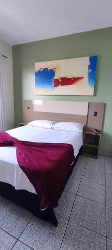 Ένα ή περισσότερα κρεβάτια σε δωμάτιο στο Hotel Gran Fenícia Marechal